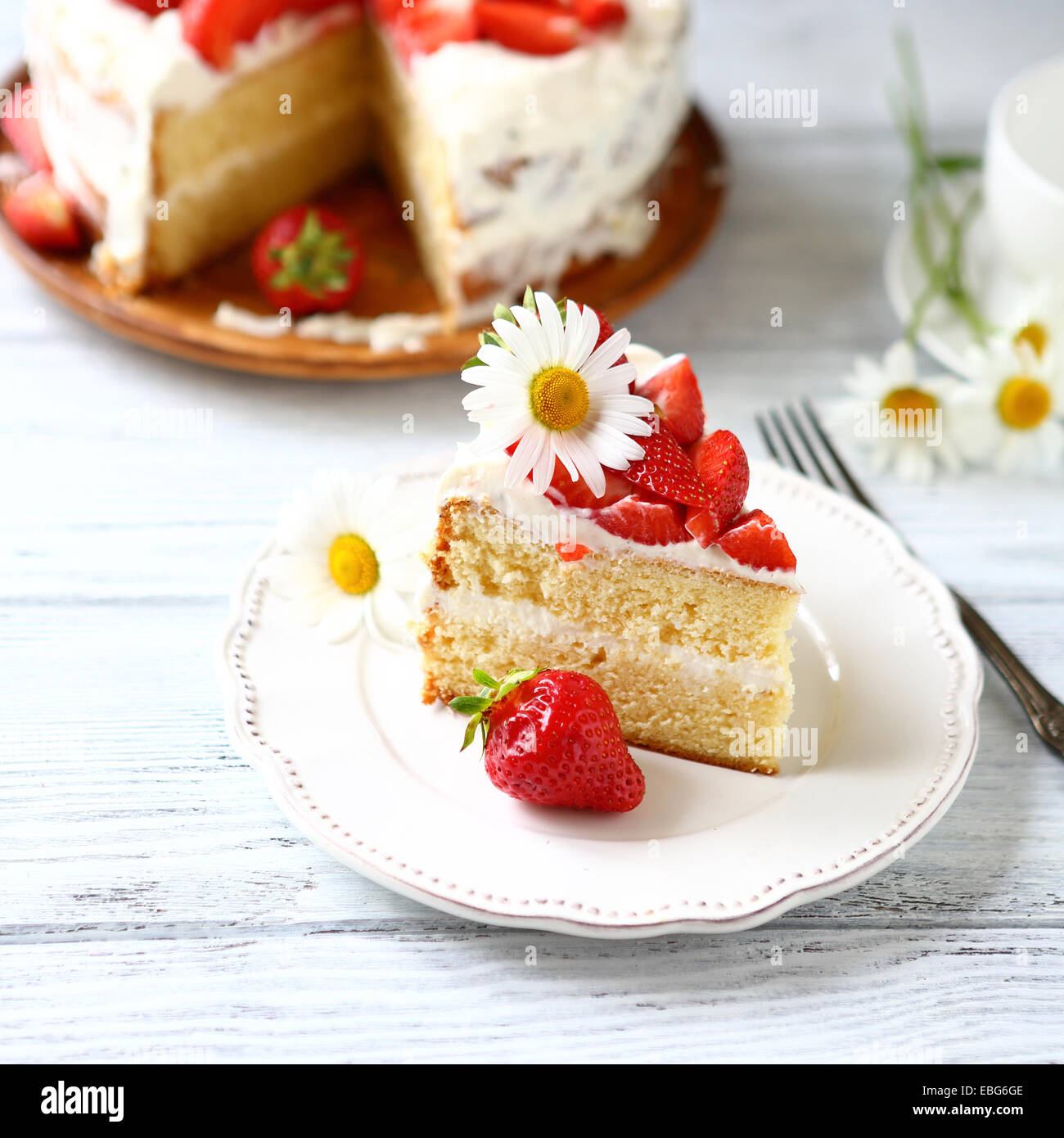 Piece of cake with strawberries, sweet food Stock Photo - Alamy
