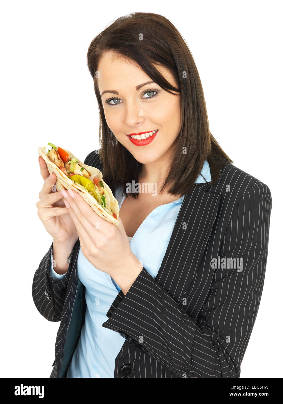 Attractive Business Woman Eating a Chicken Burger Stock Photo Alamy