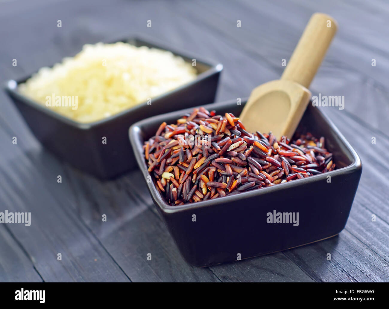 Wild rice grains wooden spoon hi-res stock photography and images - Alamy