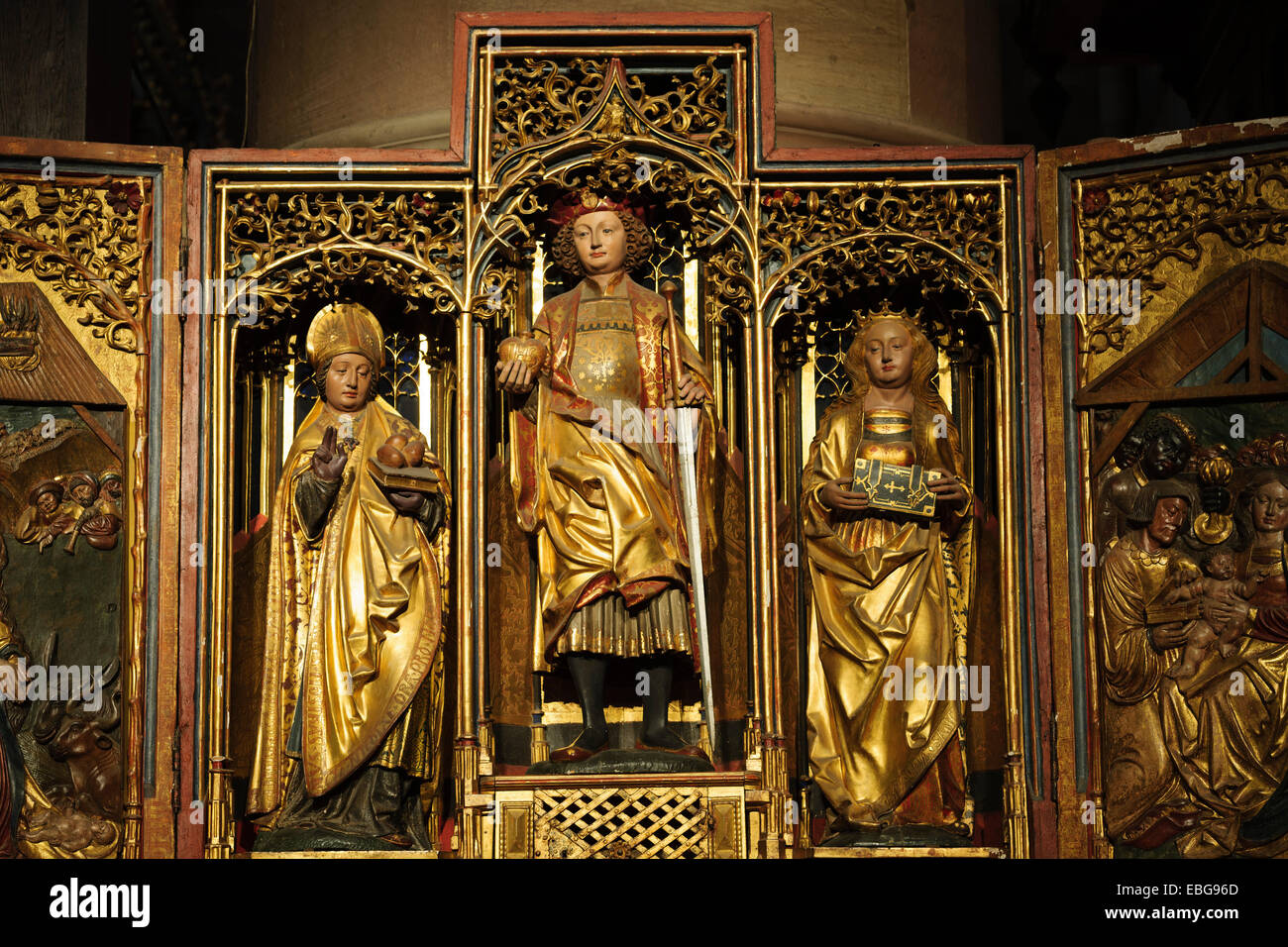 Interior view, side altar of Strasbourg Cathedral with the statues of St Nichola, St Pancrace and Ste. Catherine, Strasbourg Stock Photo