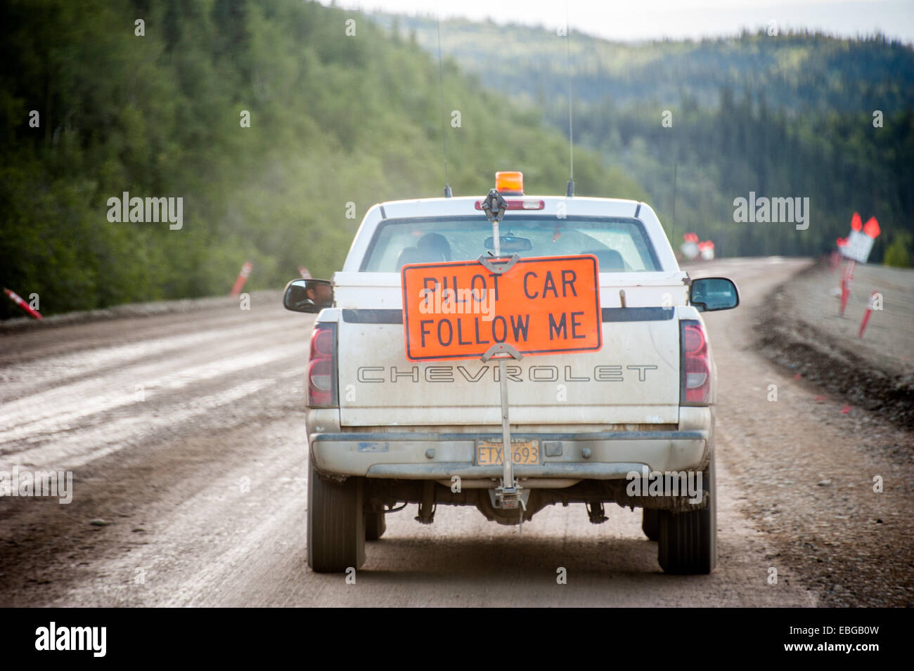 Pilot Car driving in Alaska Stock Photo