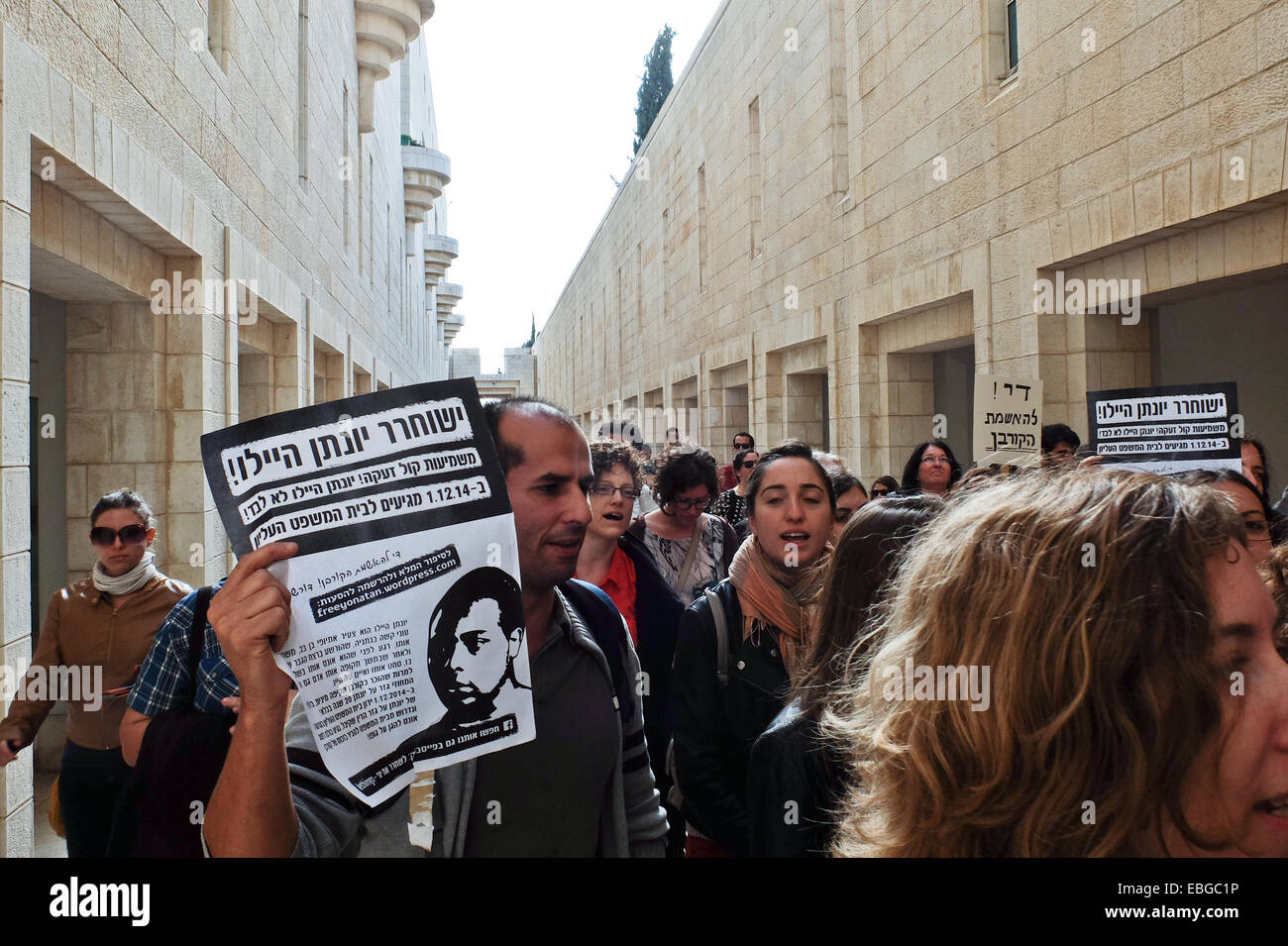 Jerusalem. 1st December, 2014. Dozens protest in support of Yonatan Hailu outside the Supreme Court as judges consider an appeal submitted on his 20 year sentence. Hailu, 24, bearing no previous criminal record, was convicted by the Lod District Court for the 2010 murder of Yaron Eileen who had previously been tried for raping an under-age girl, property crimes, extortion and assaulting police officers. Hailu claimed self defense after being extorted and raped by Eileen. Credit:  Nir Alon/Alamy Live News Stock Photo