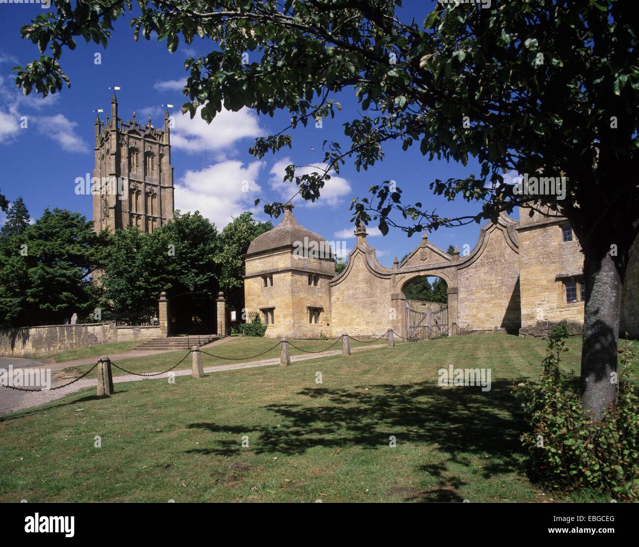 The Cotswold town of Chipping Campden with St James church and oriental-looking lodges and gateway,  Glocestershire England , Stock Photo
