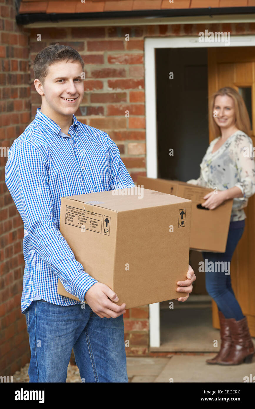 Young Couple Moving Into New Home Together Stock Photo - Alamy