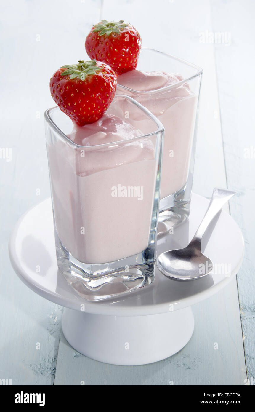 strawberry and mousse in a shot glass with spoon Stock Photo - Alamy