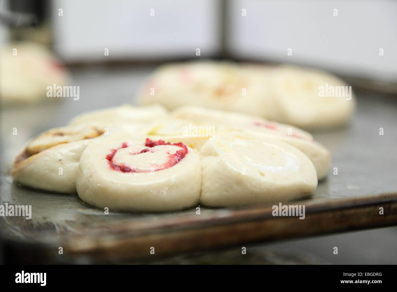 dough on a conveyor belt Stock Photo