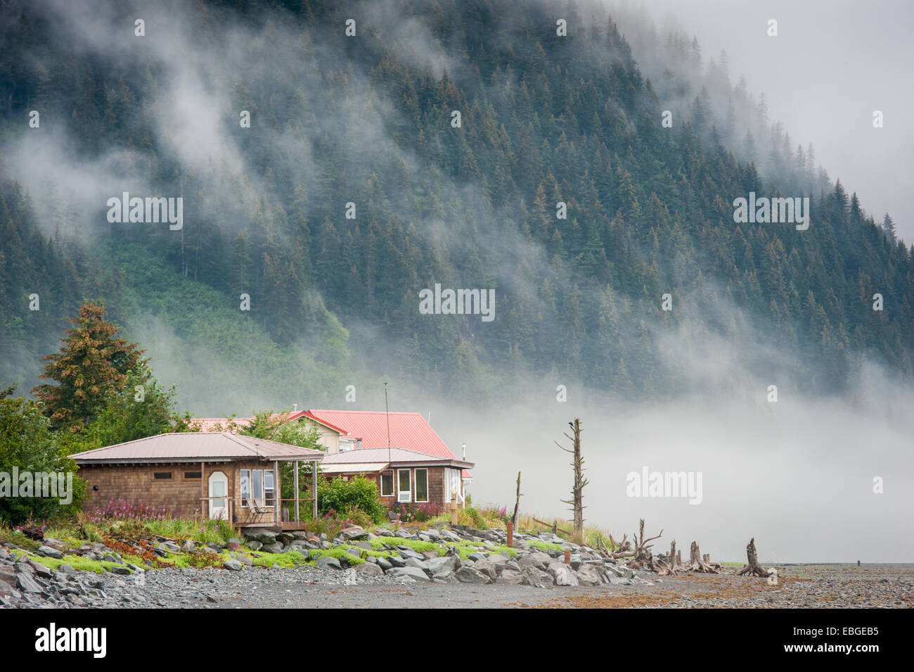 Cottage home at the base of a mountain in Seward, Alaska Stock Photo