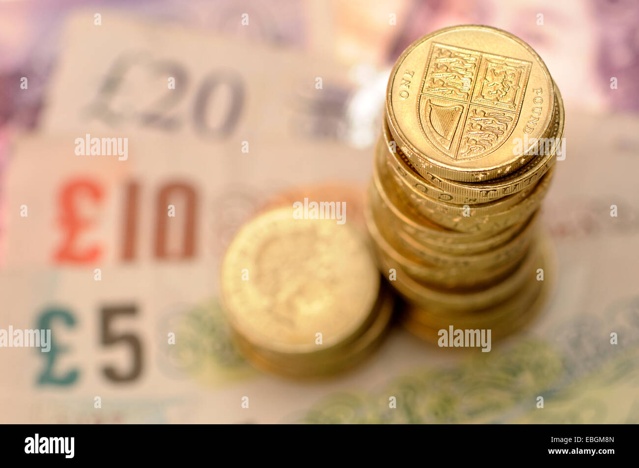 British currency - pound coins and notes Stock Photo