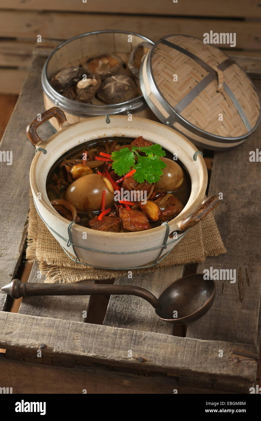 Vietnamese braised pork with eggs. Thit heo kho trung Stock Photo
