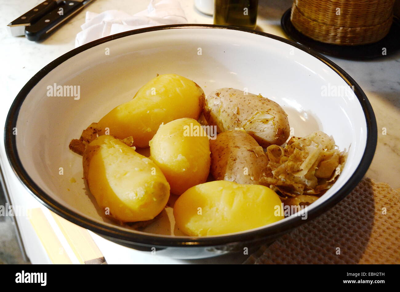 Whole boiled potatoes in a plate Stock Photo