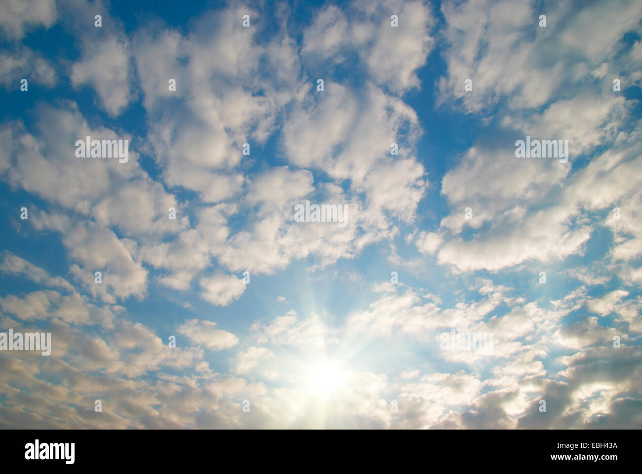 Cloudscape with rising sun can be used for background Stock Photo - Alamy