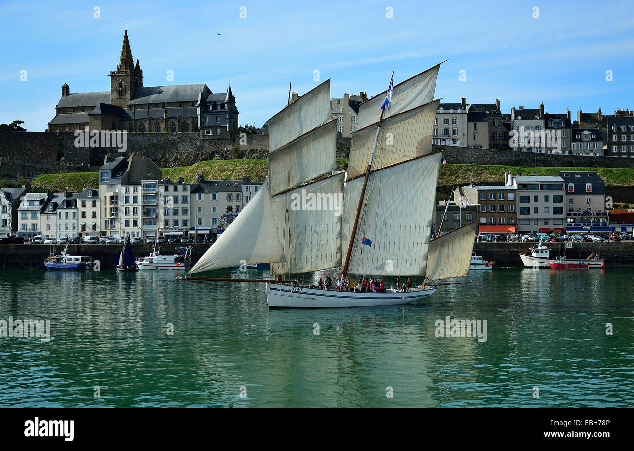 The lugger La Granvillaise parade under full sails, port of Granville, maritime event : ' Voiles de travail ' . Stock Photo
