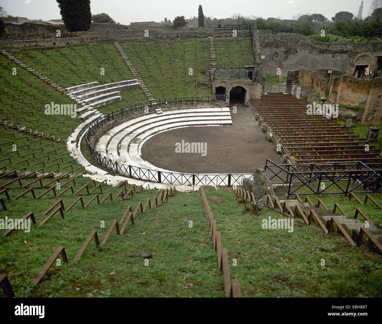 Italy. Pompeii. The Great Theatre. 2nd BC Panoramic. Seating area (Cavea), orchestra, and portico of Gladiators. Stock Photo