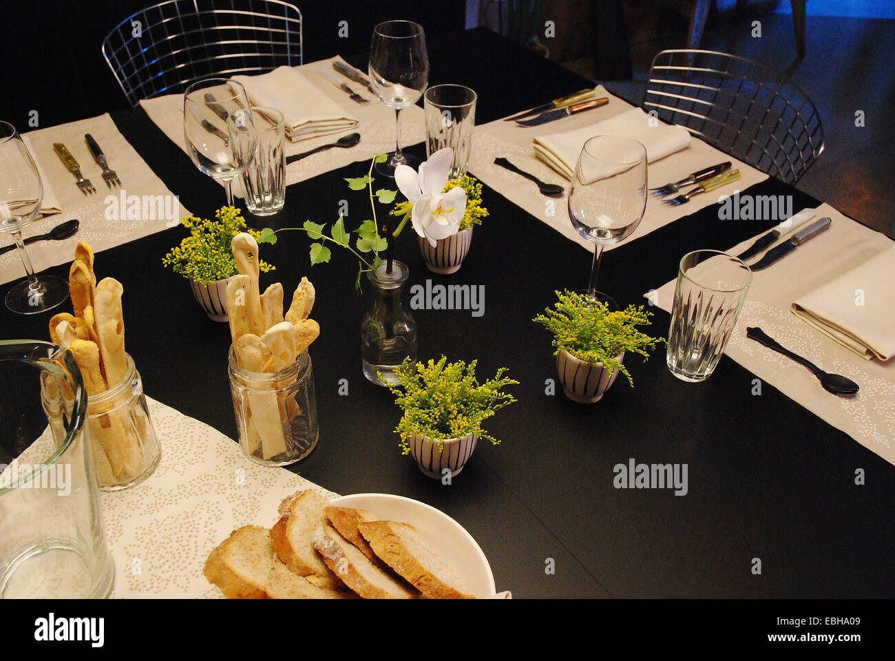 Table served for a fancy dinner Stock Photo - Alamy