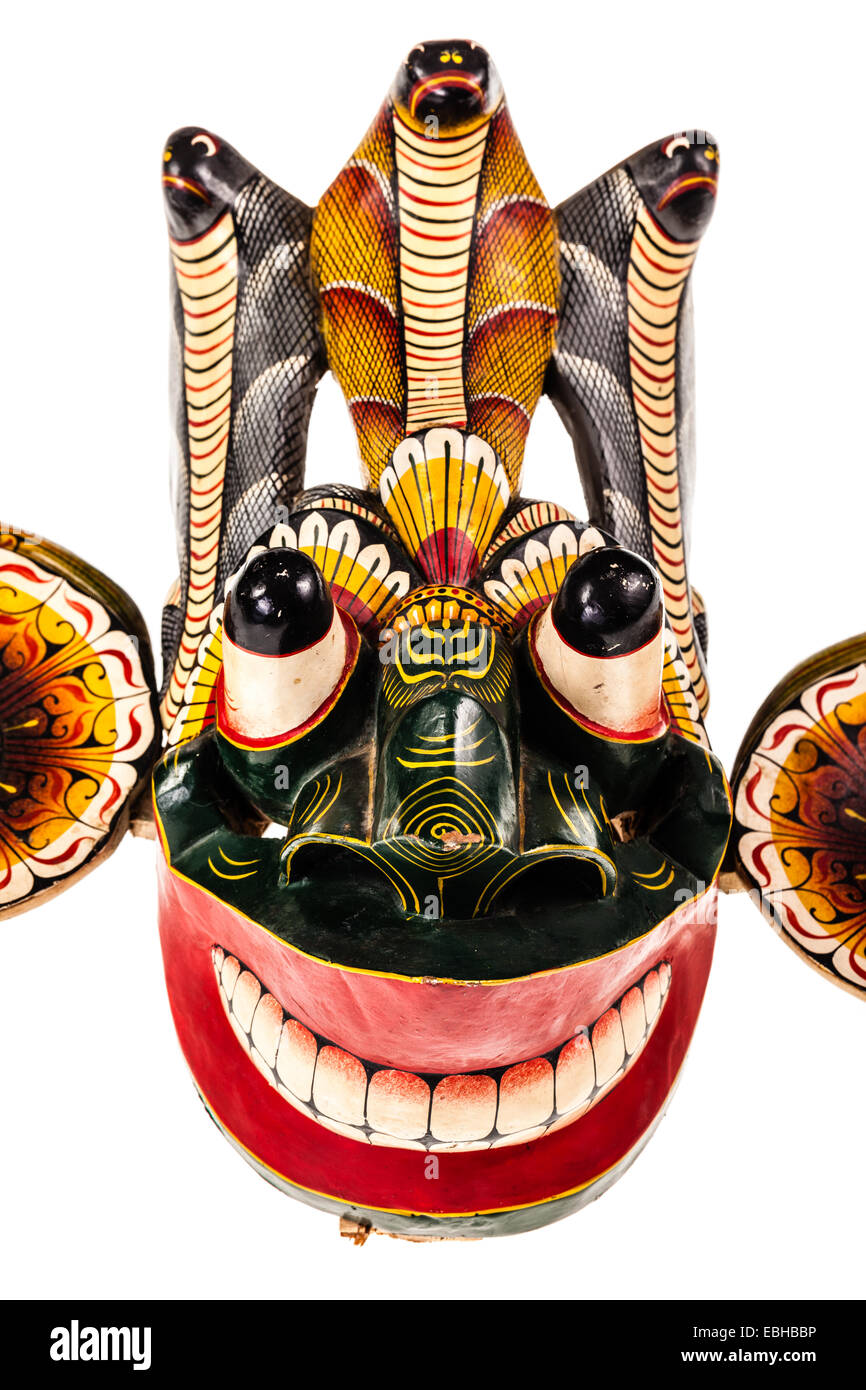 a traditional Sri Lanka Dance mask called Gara Raksha Mask, representing the King of the Demons, isolated over white Stock Photo