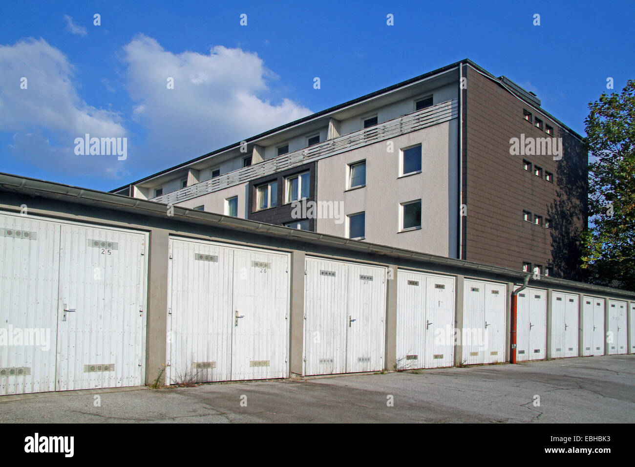 apartment house and garages, Germany Stock Photo