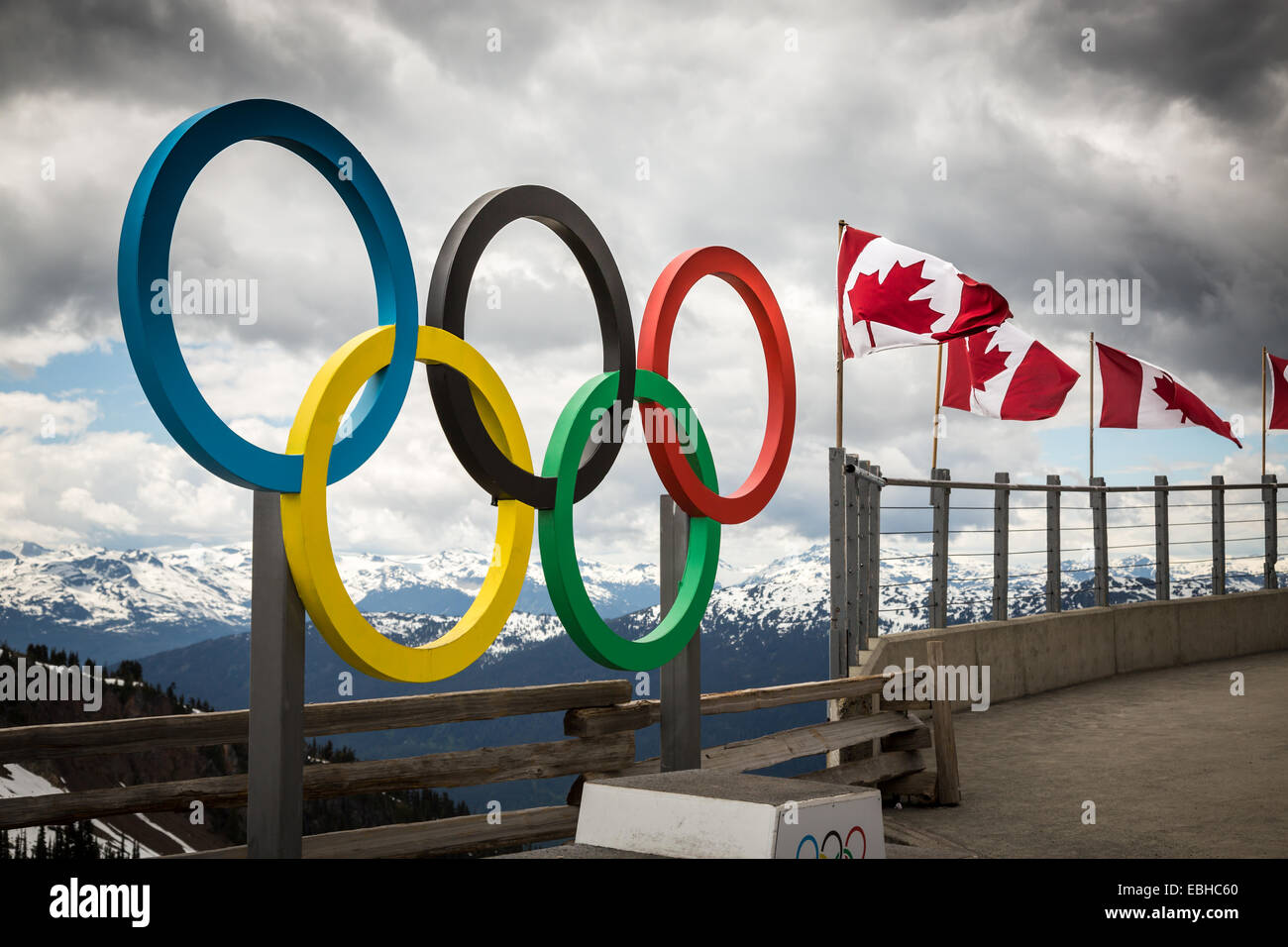 Whistler, British Columbia, Canada, North America.  Olympic rings with Canadian flags. Stock Photo