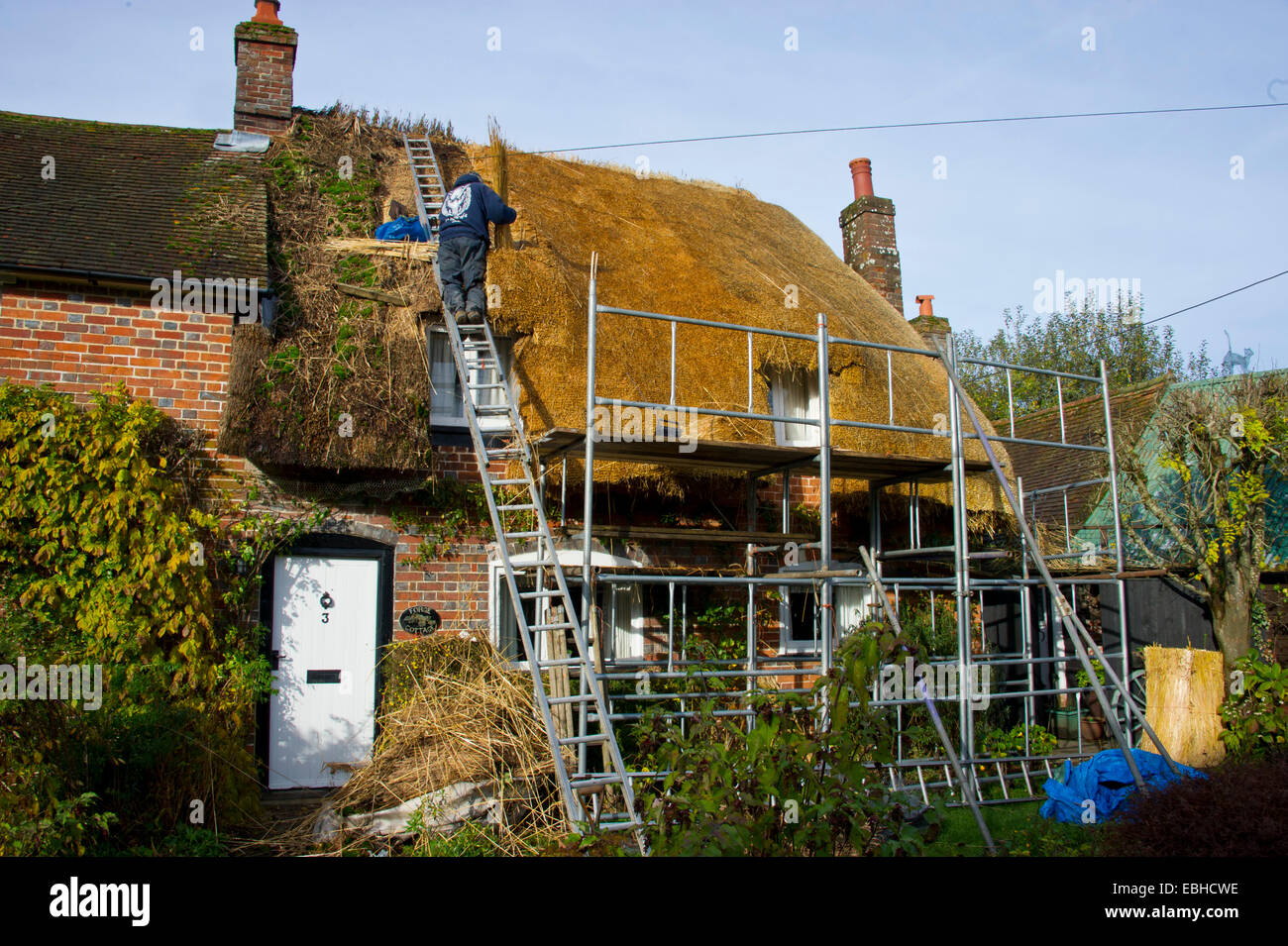 A cottage have a new thatched roof, england Stock Photo