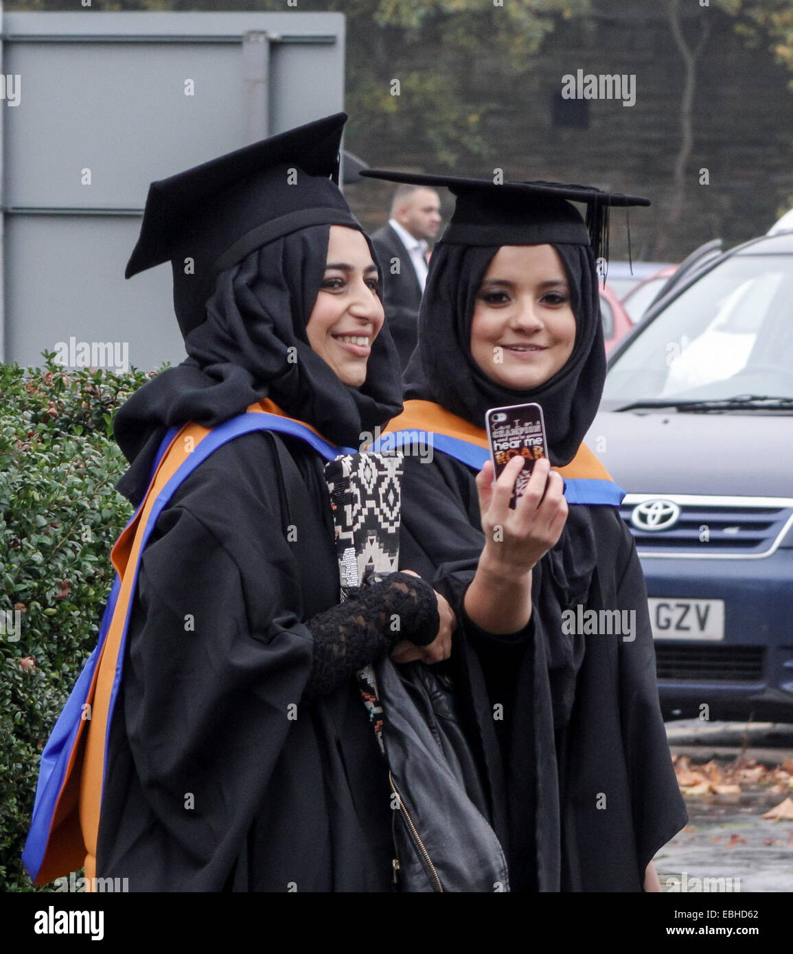 Bradford, West Yorkshire, Great Britain, Europe. Tuesday, December 1st, 2014. The first graduation ceremonies from Bradford College were held today at St George's Hall in Bradford followed by receptions at the nearby Great Victoria Hotel. Hundreds of students were present with their families from around the world. The second and final day of ceremonies will take place tomorrow. Credit:  Mick Flynn/Alamy Live News Stock Photo