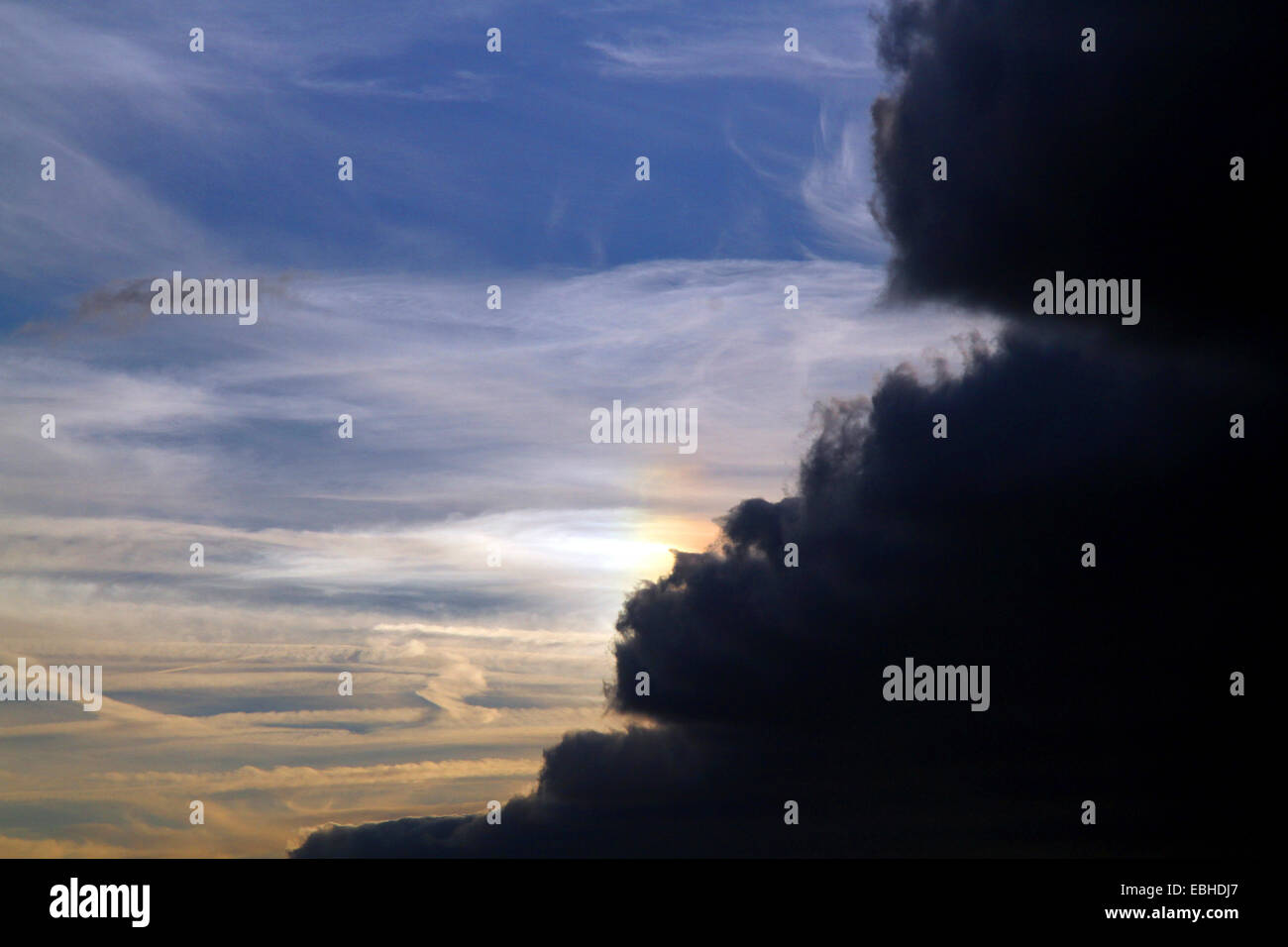cirrus clouds and dark stratocumulus clouds, Germany Stock Photo