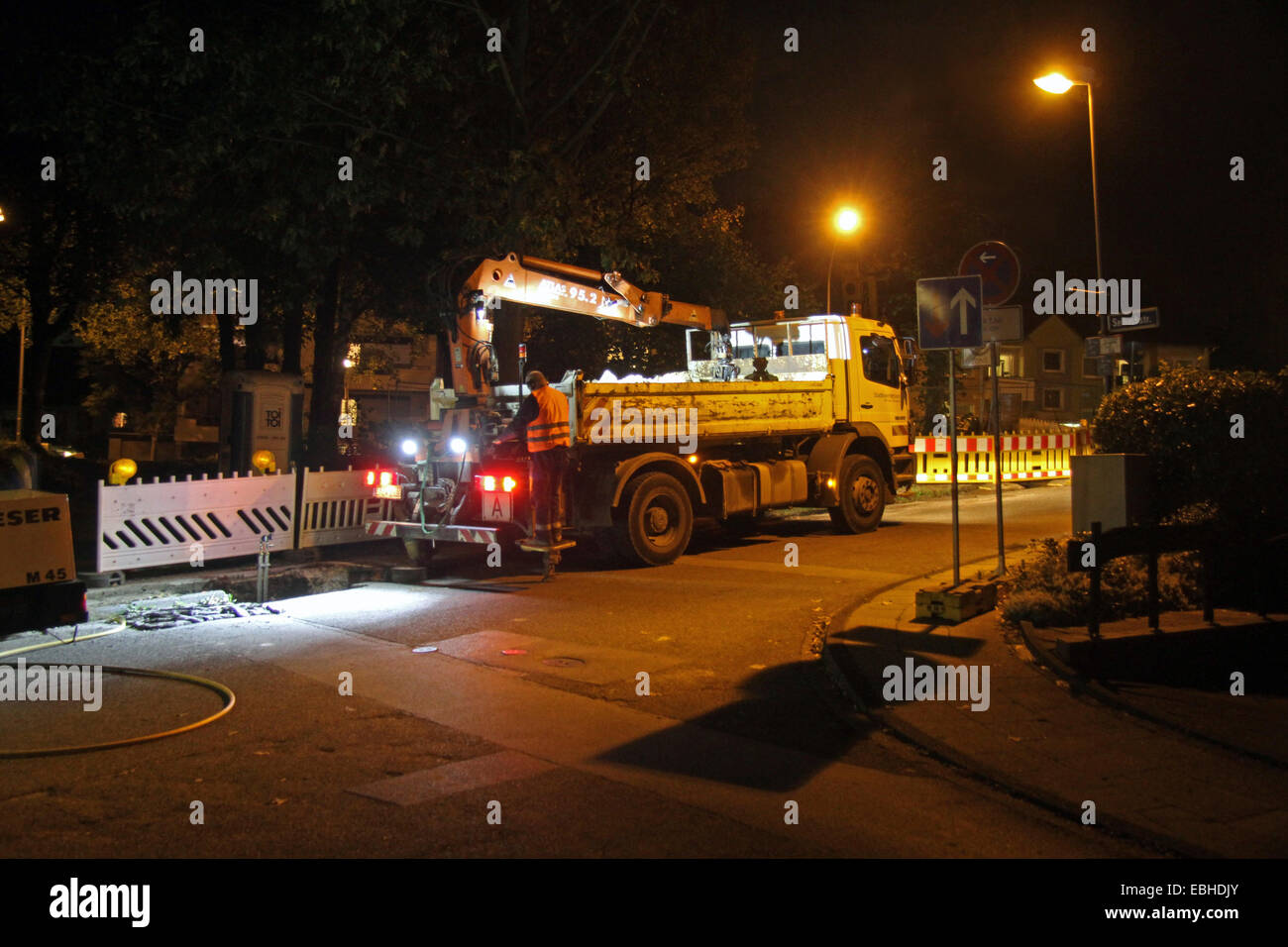repairing a broken gas pipe in the evening, Germany Stock Photo