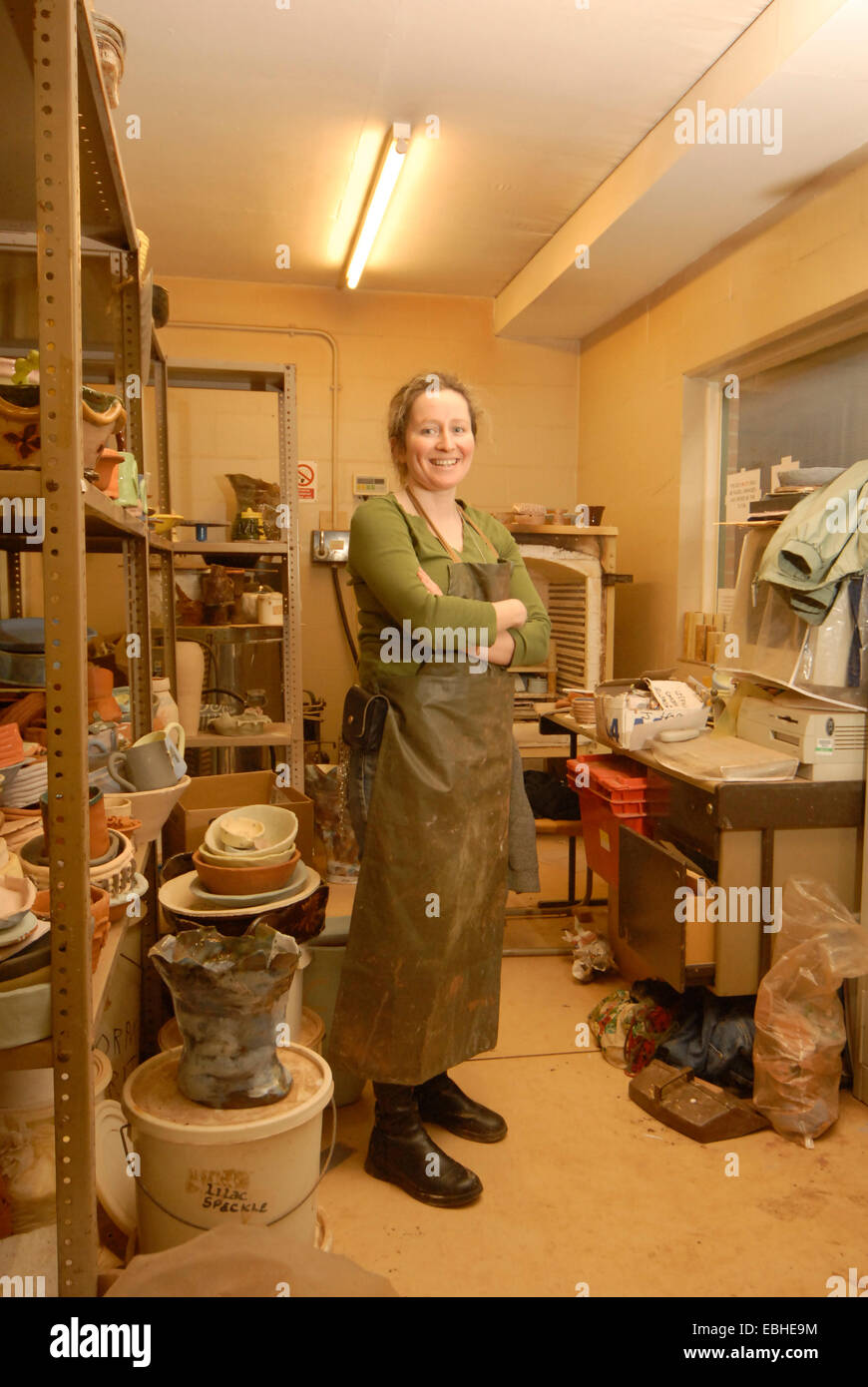 A potter in her studio Stock Photo