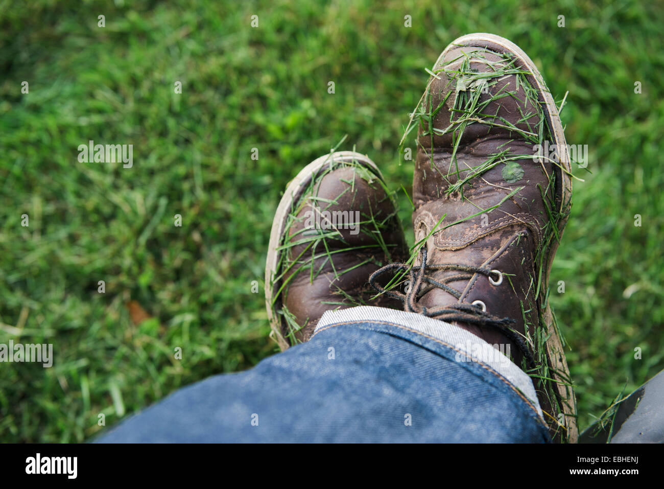 Mans shoes covered in freshly mown grass Stock Photo - Alamy