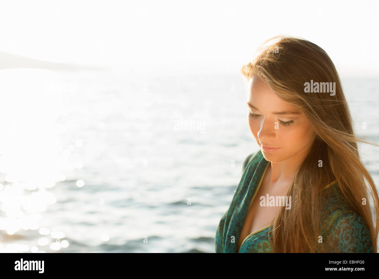 Portrait of young woman at coast, Milna, Brac, Croatia Stock Photo