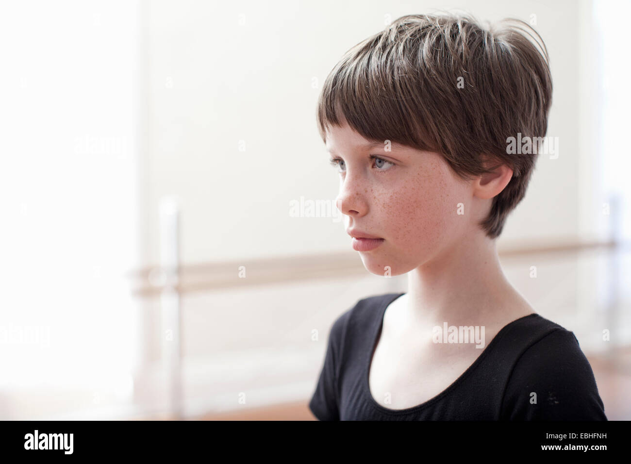 Portrait of sullen girl in ballet school Stock Photo