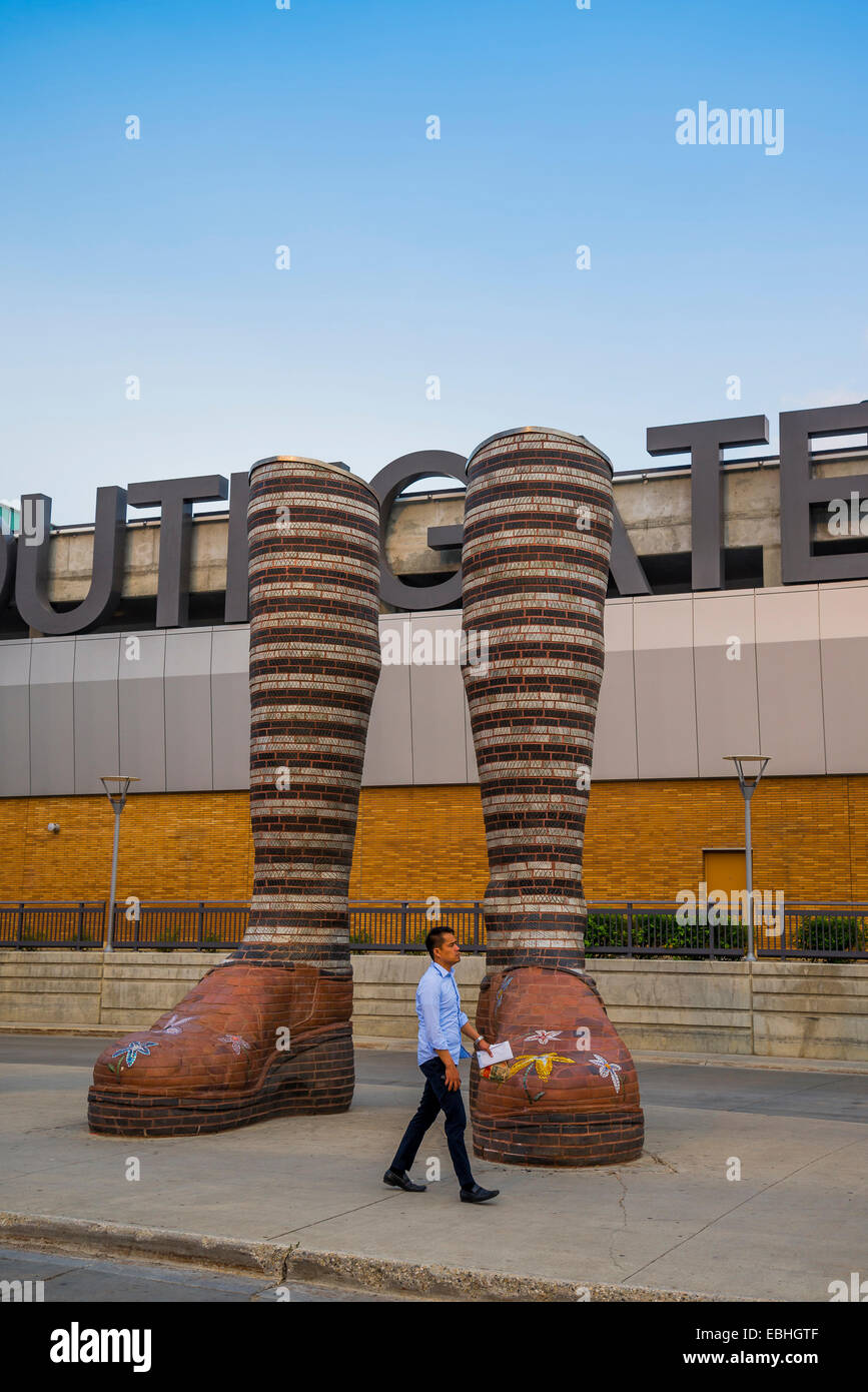 Brick sculpture of a pair of legs, called 'Immense Mode' , Southgate LRT Station, Edmonton, Alberta, Canada Stock Photo