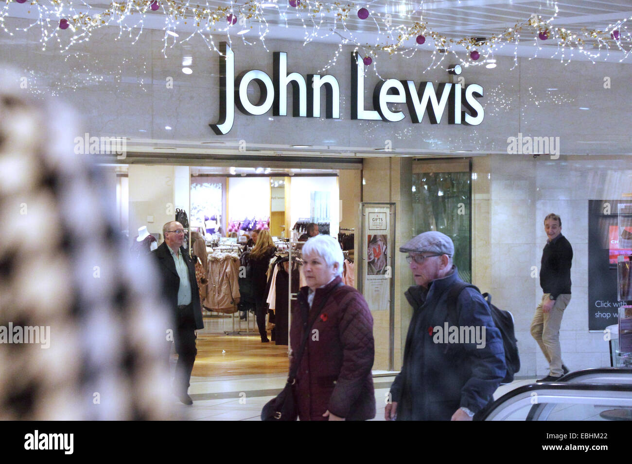 Shoppers outside a John Lewis store in Buchanan Galleries shopping arcade, Glasgow, UK Stock Photo
