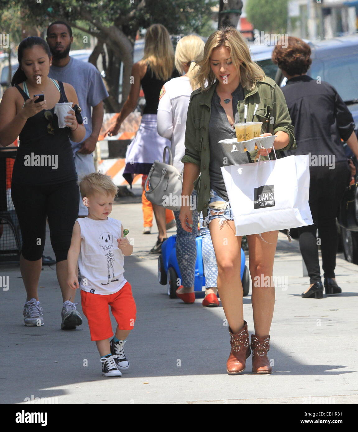 Hilary Duff, with iced tea in hand, leaves lunch at Joan's On Third