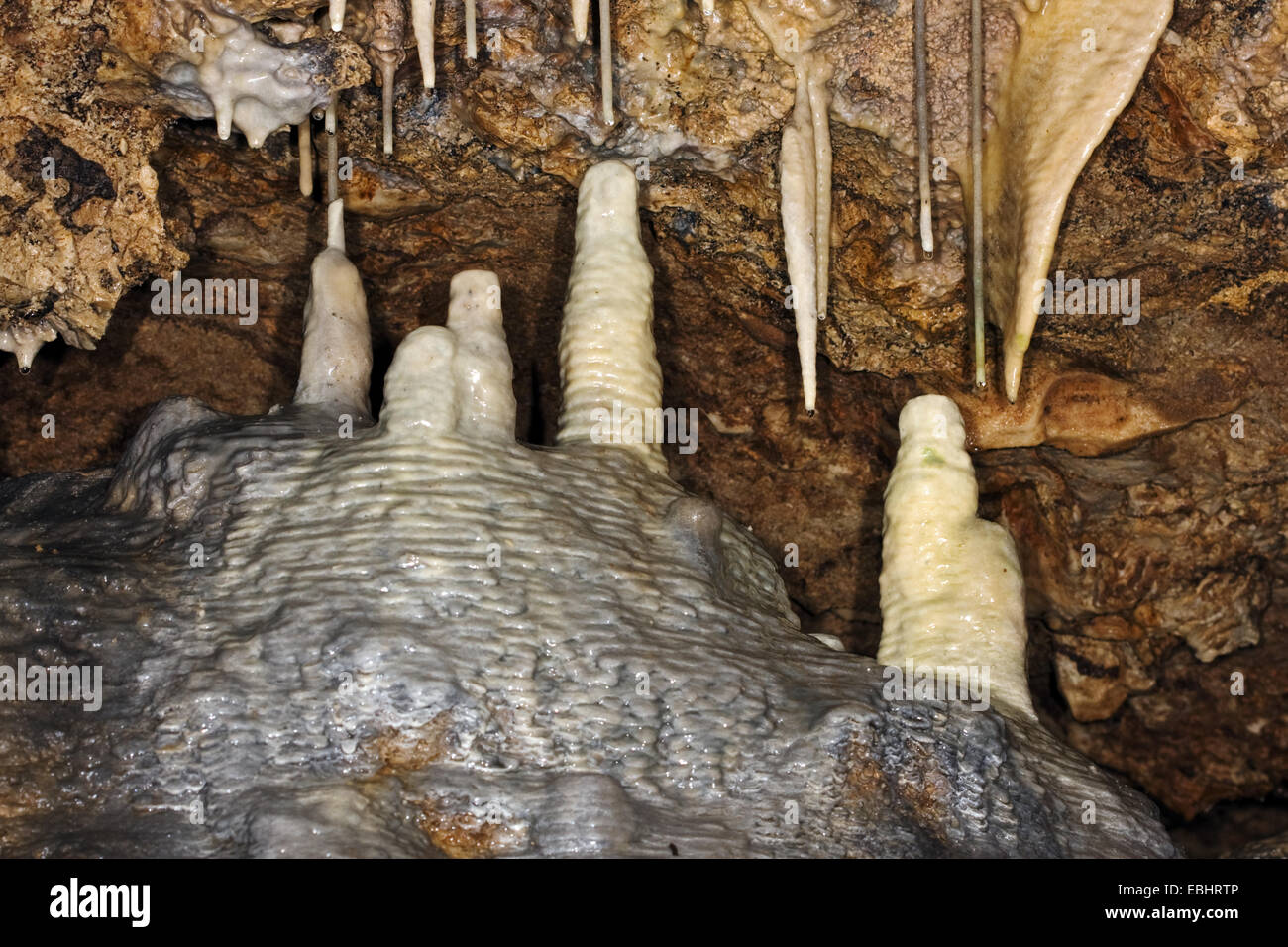 Group of stalagmites in the Lummelunda caves in Sweden. This formation is called The Altar. Stock Photo
