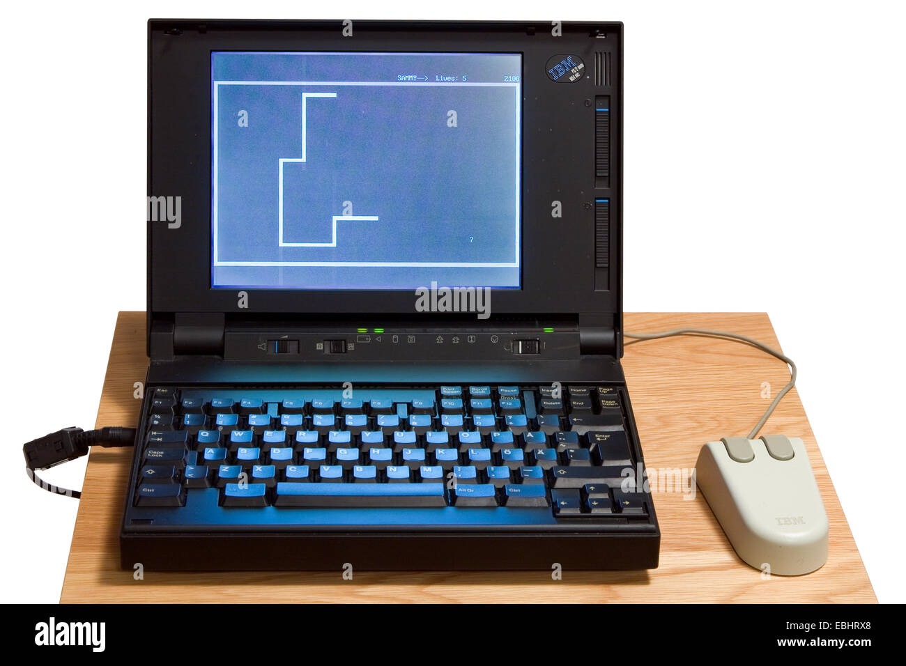 An IBM notebook from the early 1990s running the computer game Nibbles. Stock Photo
