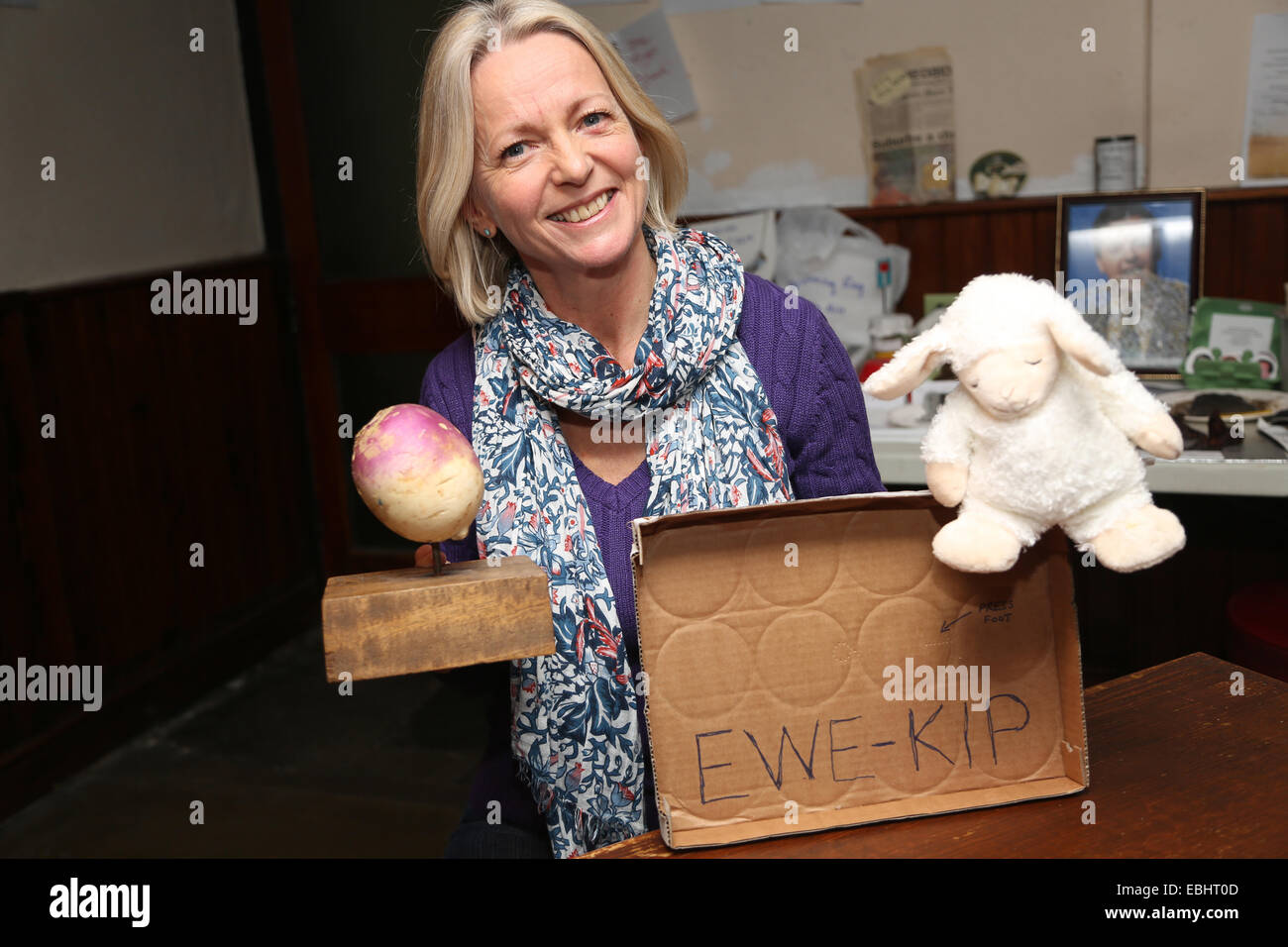 Wedmore, Somerset. 1st Dec, 2014. Drunken Shepherd with Ewe-Kip,  her winning entry of the 2014 Turnip Awards, held at the New Inn, Wedmore, Somerset. 1st December 2014. The competition mocks the prestigious Turner Prize for contemporary art Credit:  TW Photo Images/Alamy Live News Stock Photo