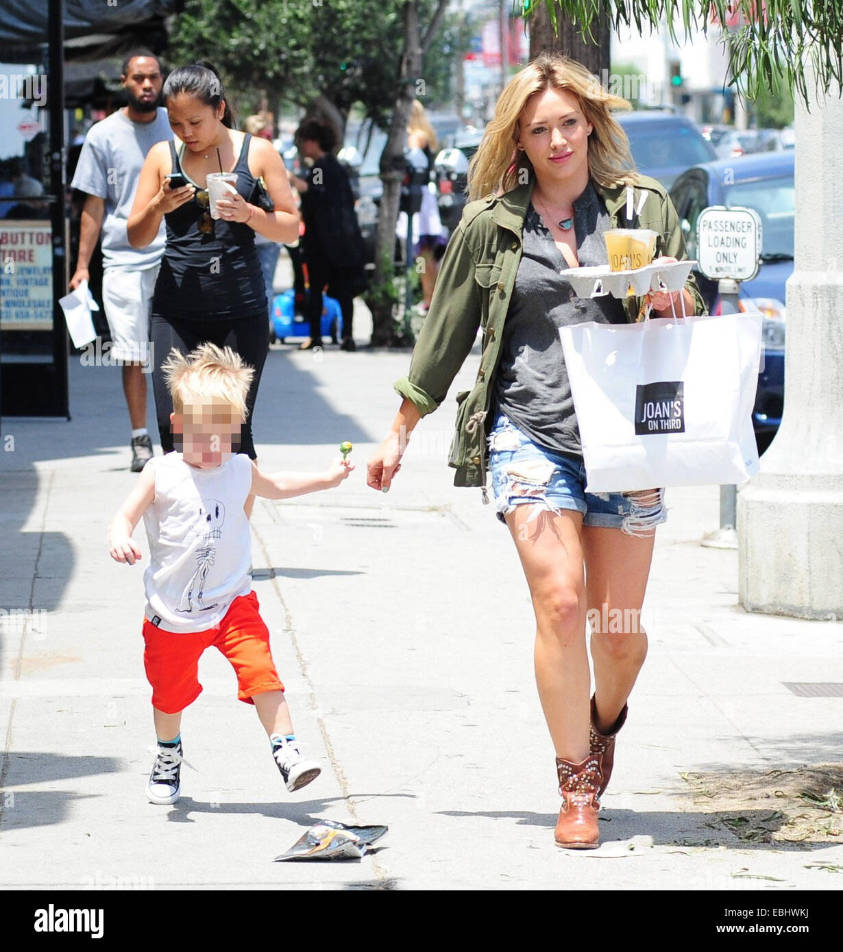 Hilary Duff, with iced tea in hand, leaves lunch at Joan's On Third