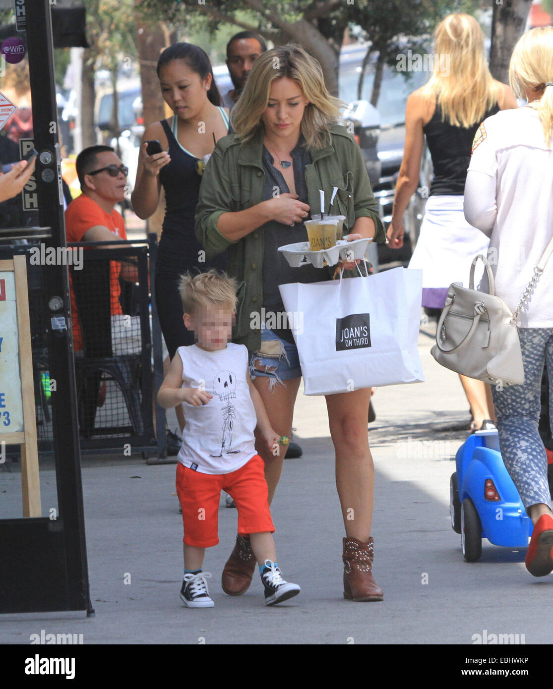 Hilary Duff, with iced tea in hand, leaves lunch at Joan's On Third