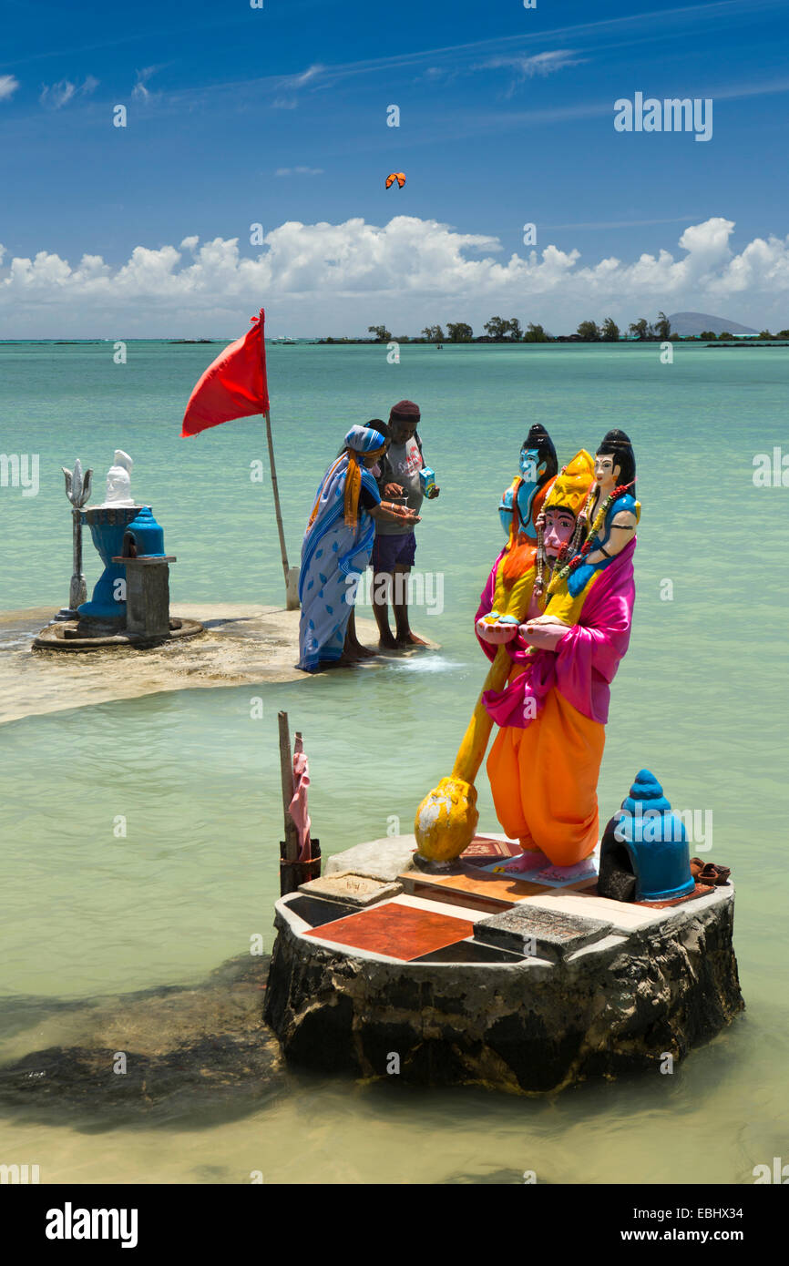 Mauritius, Grand Gaube Sai Shakti Mandir temple, Hindu worshippers at Lord Narasimha seafront shrine Stock Photo