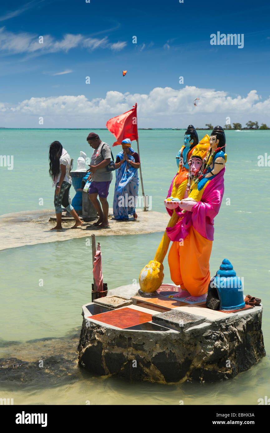 Mauritius, Grand Gaube Sai Shakti Mandir temple, Hindu worshippers at Lord Narasimha seafront shrine Stock Photo