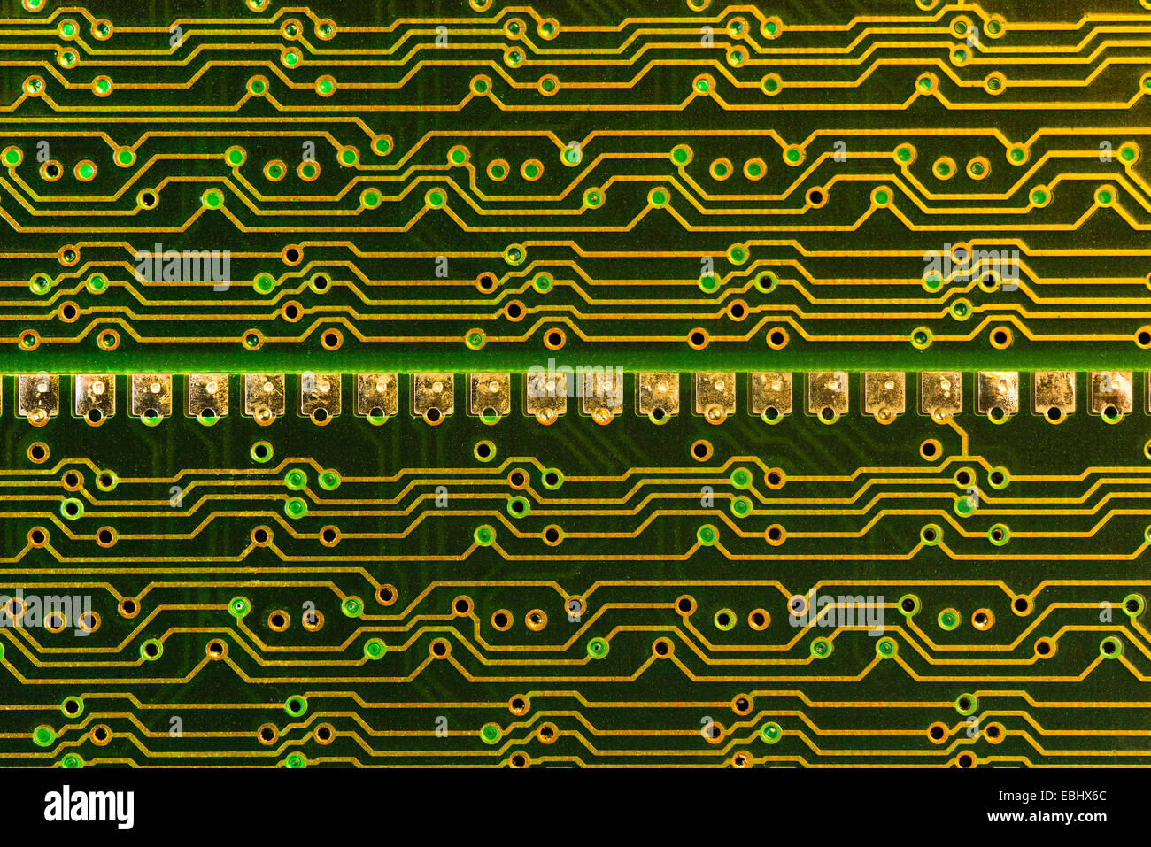 Electrical component parts of printed circuit boards at a macro level RAM surface mount technology golden printed conducting Stock Photo