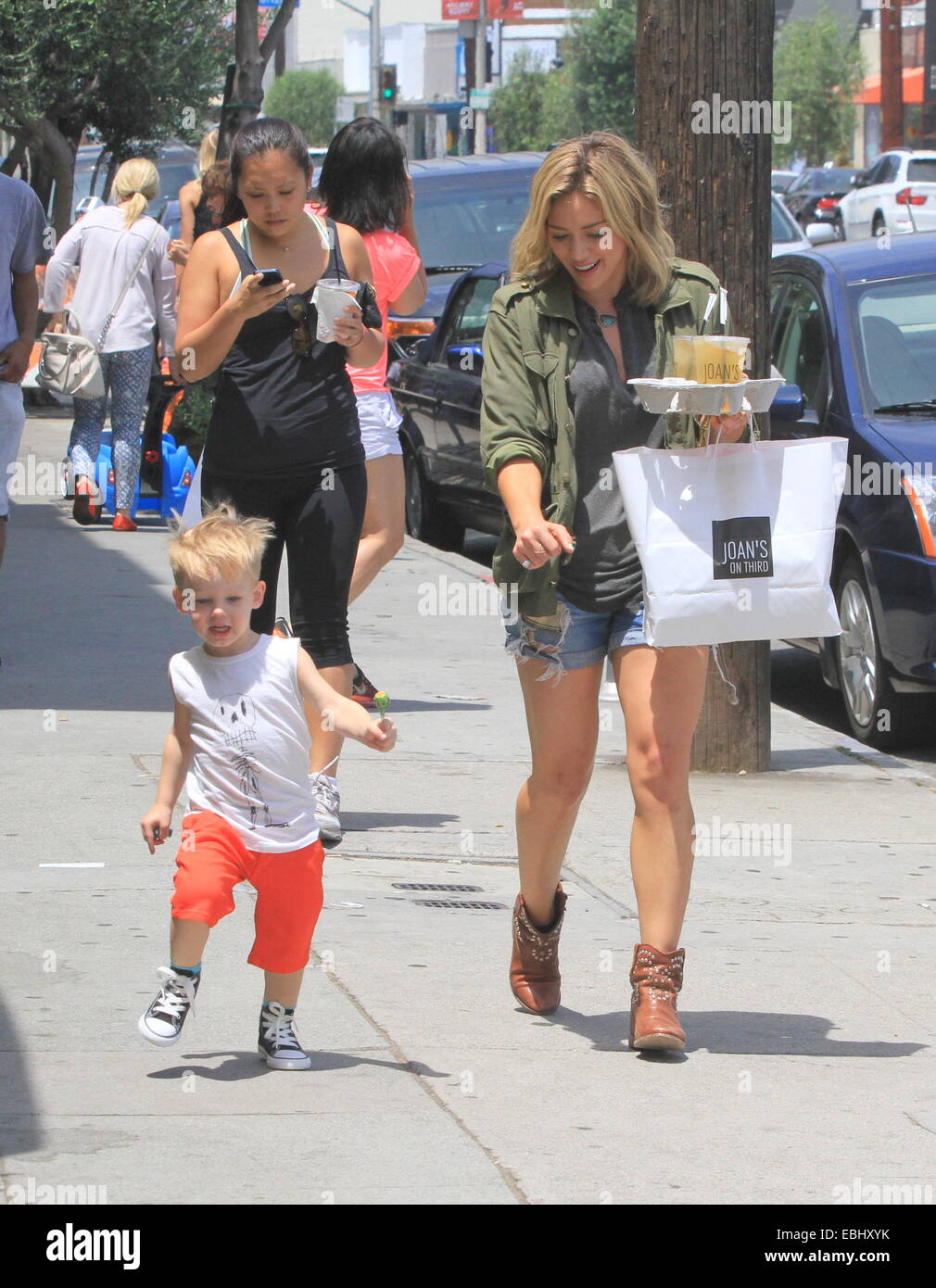 Hilary Duff, with iced tea in hand, leaves lunch at Joan's On Third