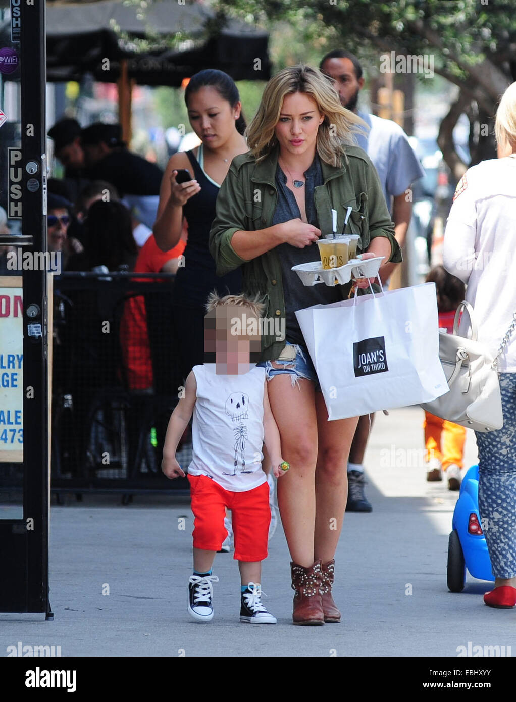 Hilary Duff, with iced tea in hand, leaves lunch at Joan's On Third