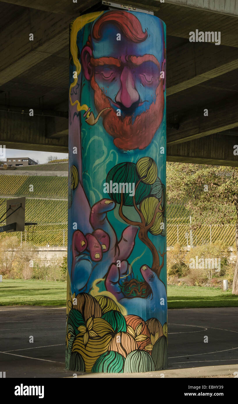 Franconia Franken Wuerzburg Würzburg street art graffiti at a column of the Friedensbrücke Stock Photo