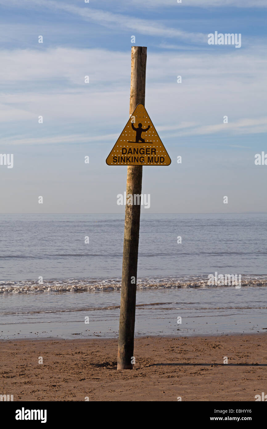 Sign warning of dangerous soft mud on the beach at WestonsuperMare
