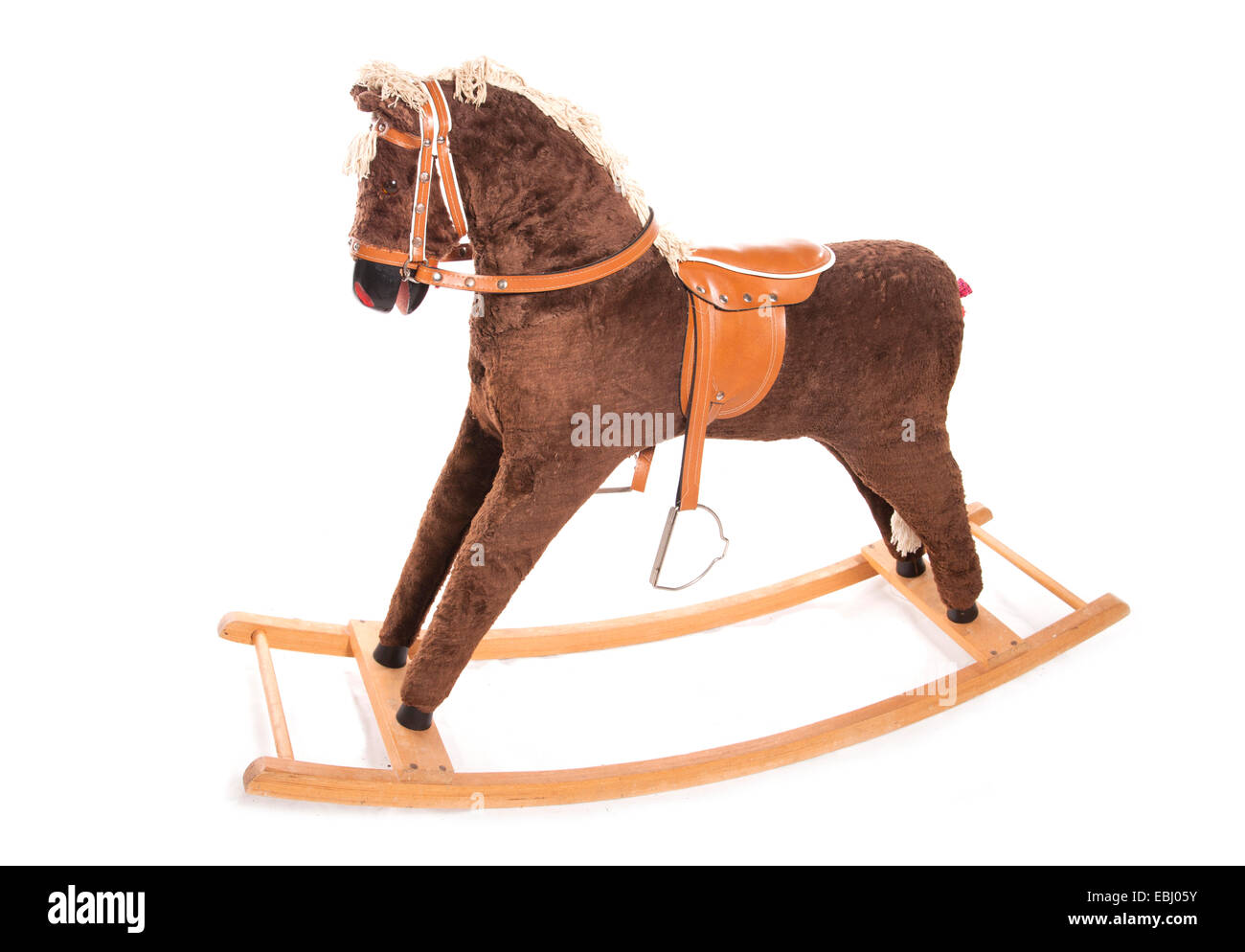 vintage brown rocking horse studio cutout Stock Photo