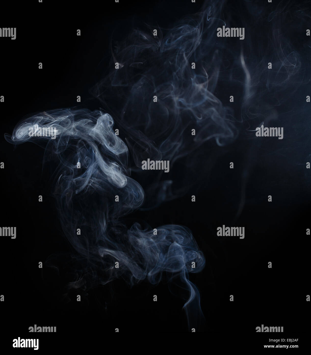 Abstract smoke moves on a black background Stock Photo - Alamy