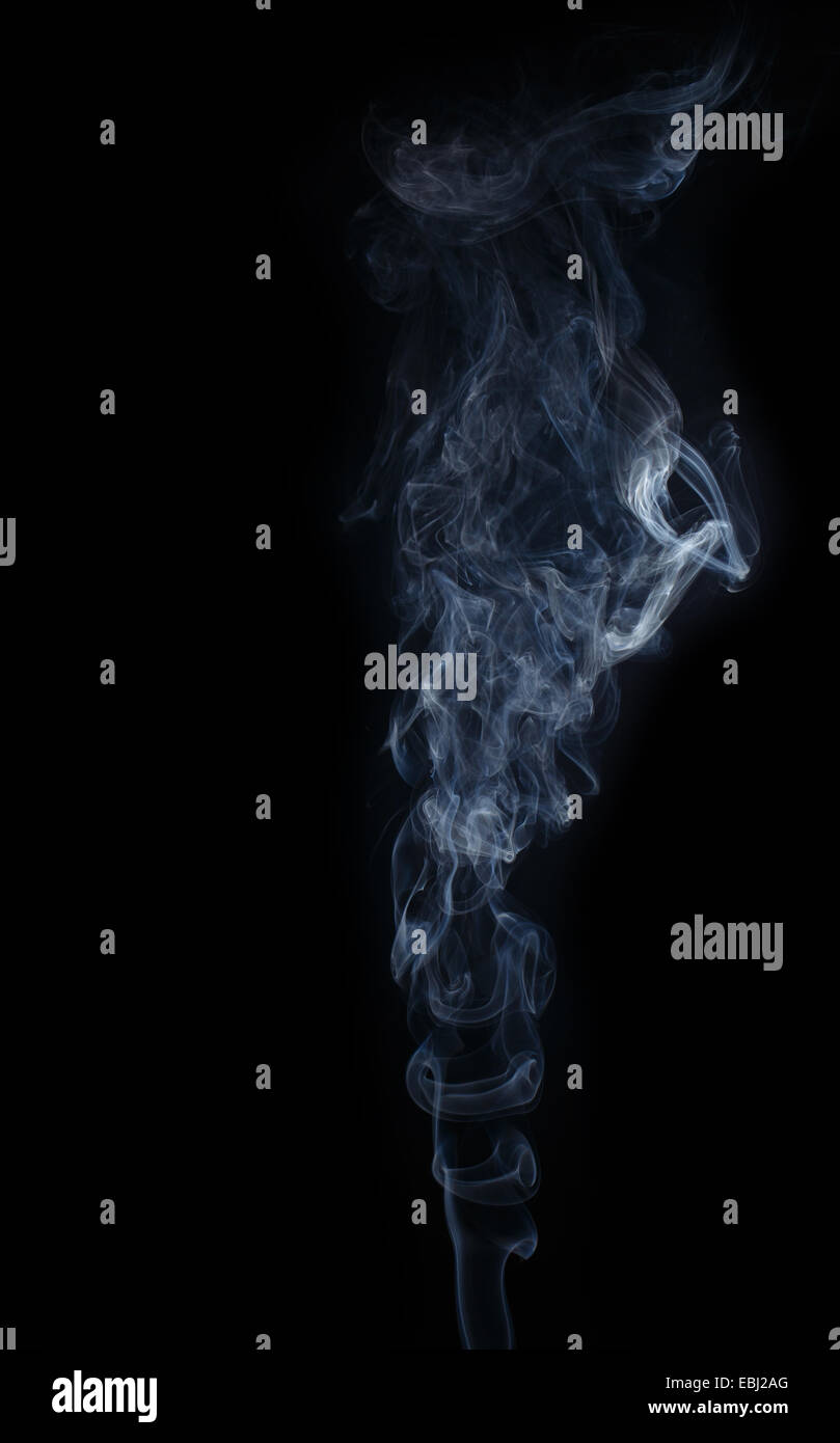 Abstract smoke moves on a black background Stock Photo - Alamy