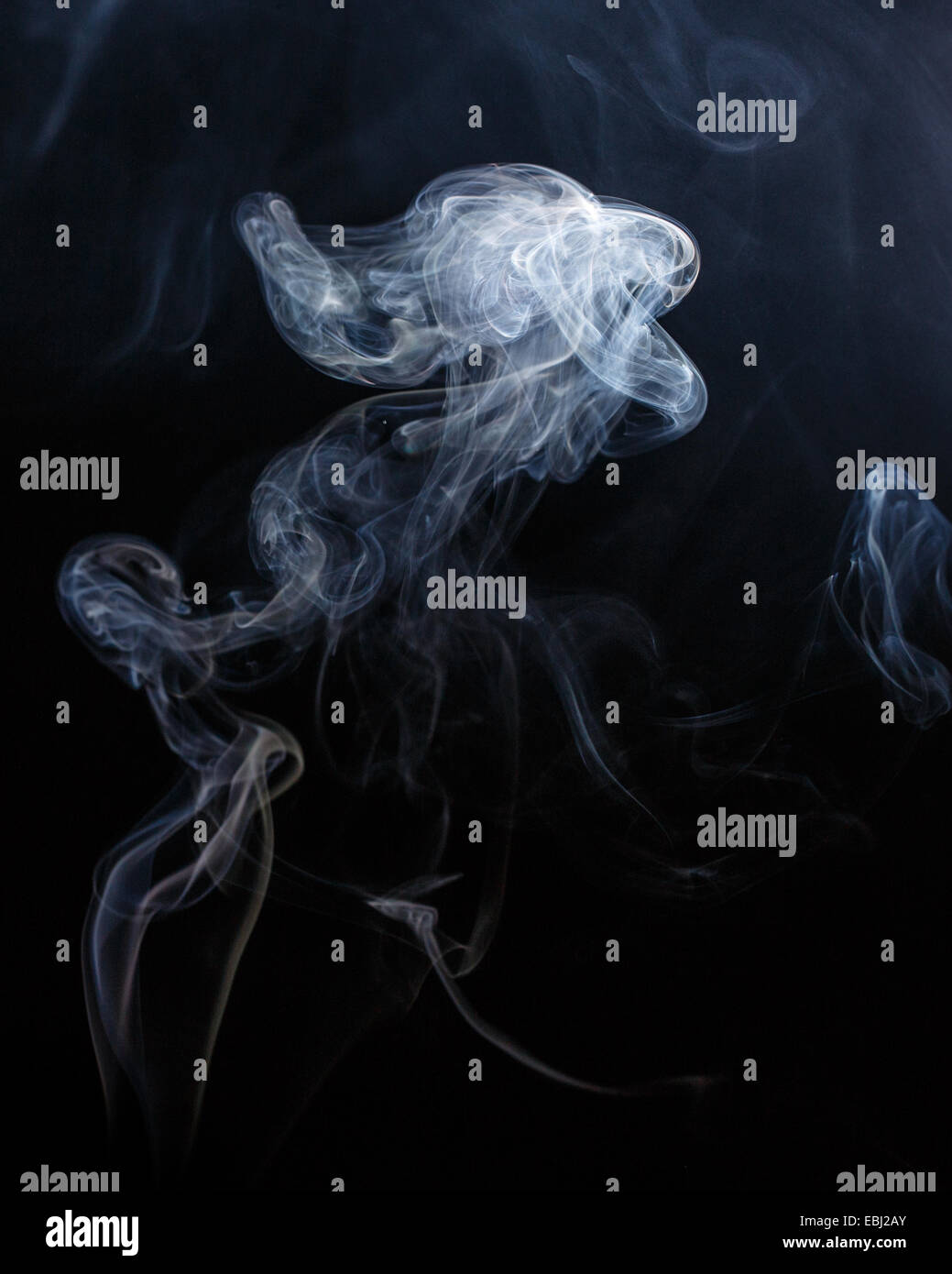 Abstract smoke moves on a black background Stock Photo - Alamy