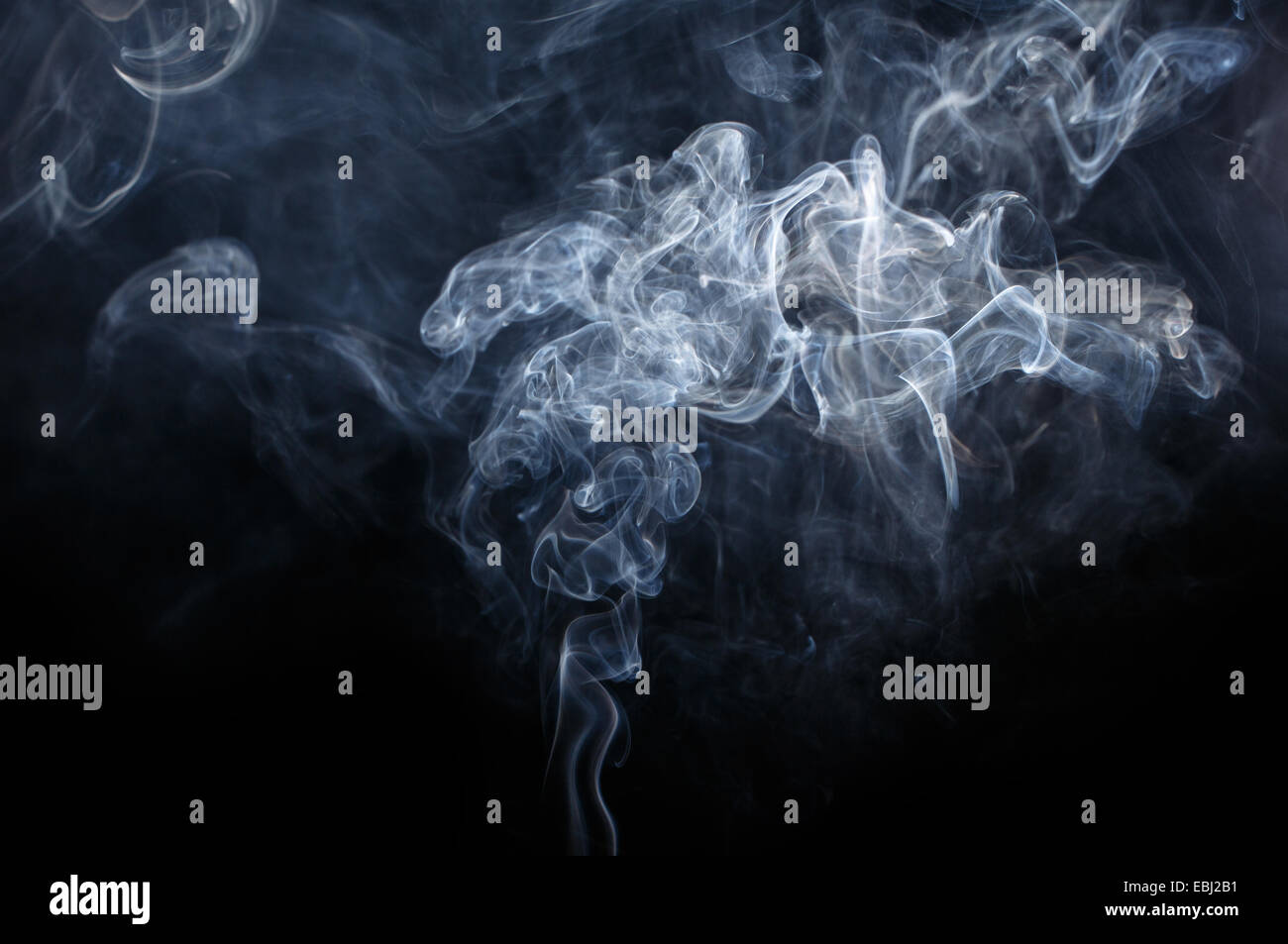 Abstract smoke moves on a black background Stock Photo - Alamy