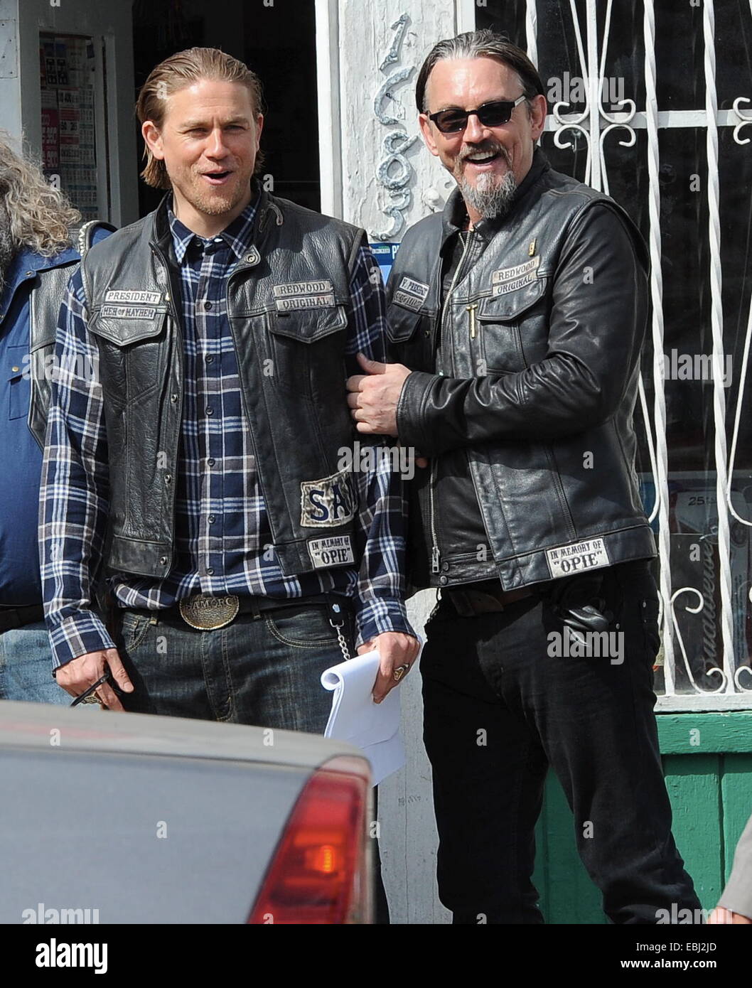 Charlie Hunnam hops on his bike on the set of 'Sons Of Anarchy' after taking time off to film his new movie Crimson Peak in Canada. The uk actor was seen fooling around with the rest of the cast as they film the last season to their hit biker show.  Featu Stock Photo